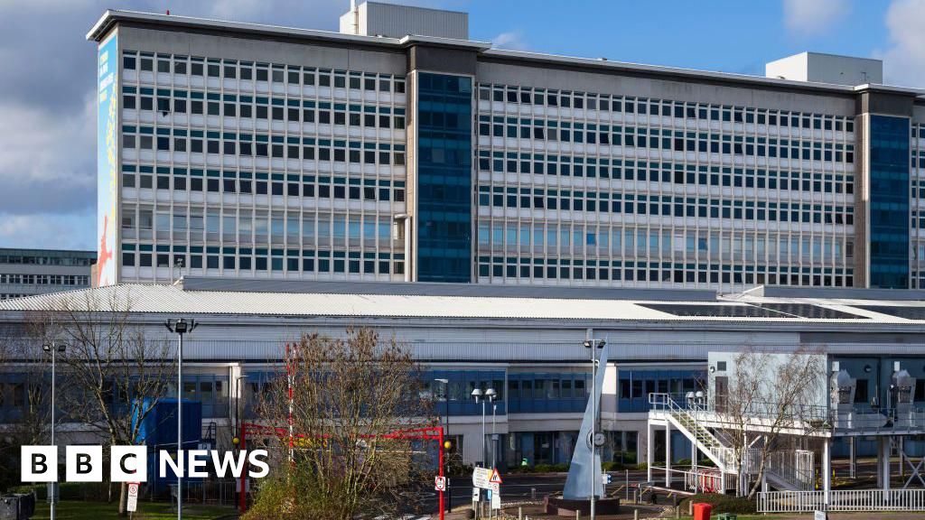 Top surgeon who was 'blackmailed' for drugs after having sex with patient is suspended